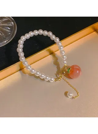 White Bracelet with Peach Charm Pearls 