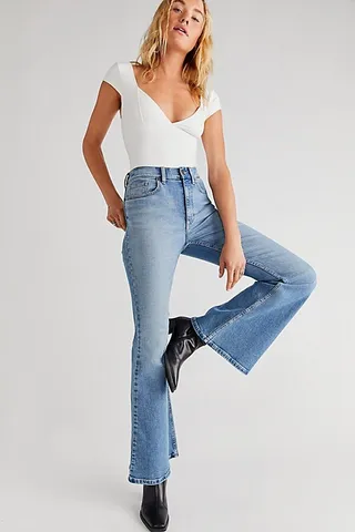 Lee High-Rise Flare Jeans by Lee at Free People