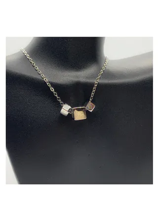 A Unique Silver women's necklace with a cube-shaped pendant design 