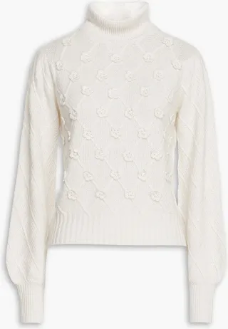 Floral-appliqued crochet-knit turtleneck sweater
