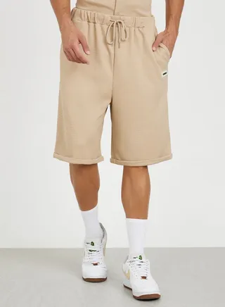 Waffle Knit Oversized Shorts with Turn Up Hem & Badge Detail