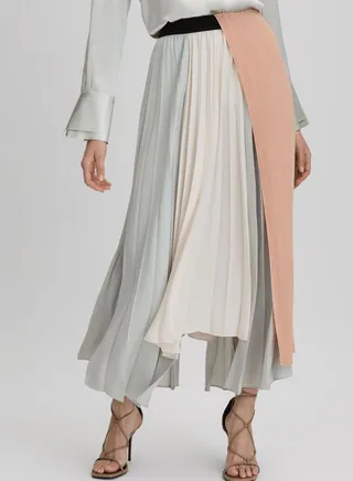 Asymmetrical Hem Pleated Skirt