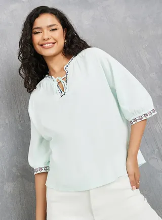 Embroidered Tie Up Neck Blouse