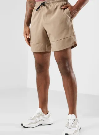 7" Tenacity Woven Shorts