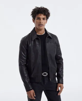 Aged-effect leather jacket with ribbed edges