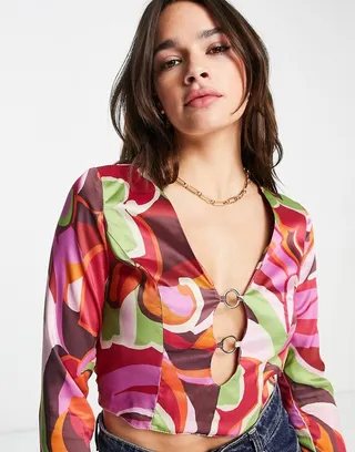 ASOS DESIGN long sleeve top with ring detail & choker neck in 70s floral print