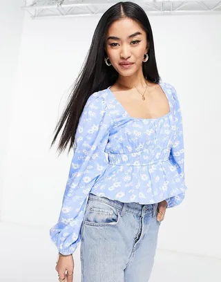 ASOS DESIGN shirred waist long sleeve top in blue floral print