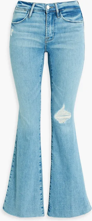 Le Pixie distressed high-rise flared jeans