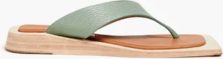 Valeria pebbled-leather flip flops