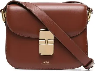 Shoulder bag made of smooth cowhide featuring a contrasting logo printed on the front.