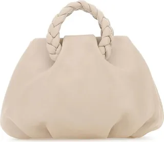 Handbag realized in nappa leather characterized by tonal leather shoulder strap.