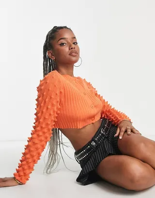 ASOS DESIGN crop cardigan with 3D textured stitch in orange