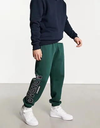 adidas Originals Preppy Varsity large logo oversized sweatpants in dark green