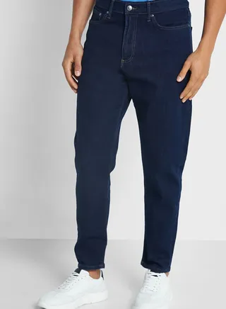 Mid Wash Tapered Fit Jeans
