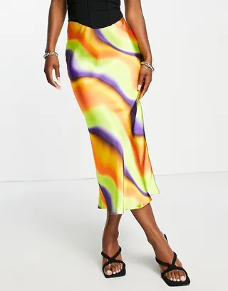ASOS DESIGN satin bias midi skirt in bright tie dye print