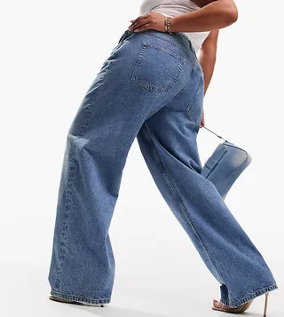 ASOS DESIGN Curve baggy boyfriend jeans in mid blue