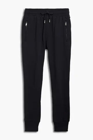 Tapered logo-appliquéd cotton-blend twill pants