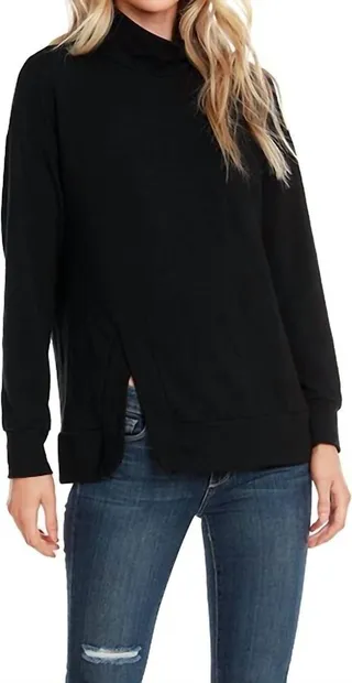 Long Sleeve Turtleneck Slit Hem Top in Black