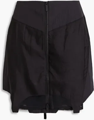 Mesh-paneled shell mini skirt
