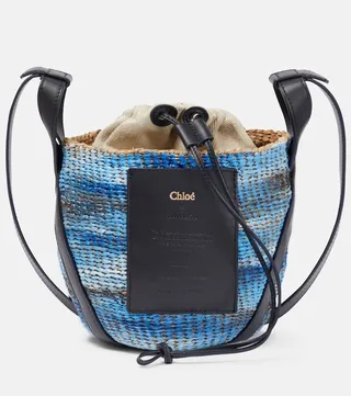Tie-dye linen and raffia bucket bag