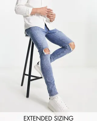 ASOS DESIGN spray on jeans with power stretch in mid wash with knee rips and abrasions