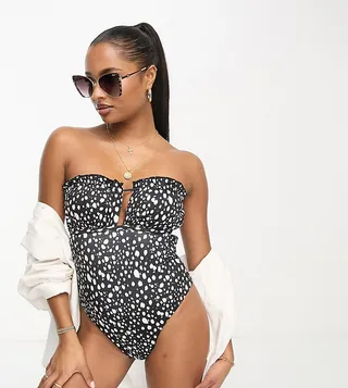 ASOS DESIGN Petite bandeau frill swimsuit in monochrome spot print