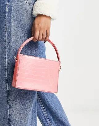 ASOS DESIGN boxy bag with top handle with detachable strap in pink croc