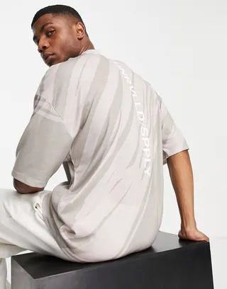 ASOS Unrvlld Spply oversized t-shirt with diagonal abstract print in neutral