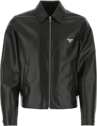 Jacket realized in lamb nappa leather enriched by iconic metal logoed triangle on the chest.
