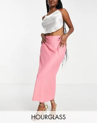 ASOS DESIGN Hourglass satin bias midi slip skirt in bubblegum pink