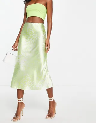 ASOS DESIGN satin bias midi skirt in yellow leopard print