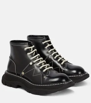 Tread patent leather ankle boots