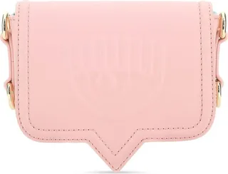 Crossbody bag that can be worn as a belt bag realized in synthetic leather characterized by logo in relief at the front enriched by contrasting rubberized logoed patch at the back.