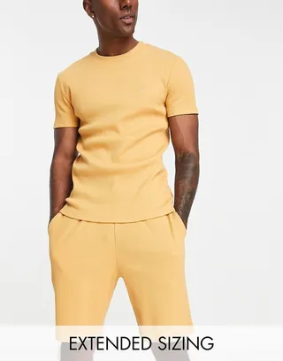 ASOS DESIGN pajama set with t-shirt and shorts in yellow with rose embroidery