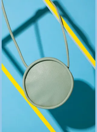 Solid Zip Lock Hand Bag with Round Shape