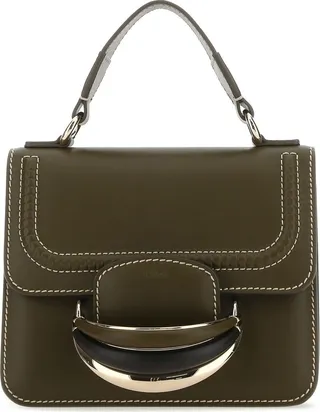 Deep olive Mud Leather Small Kattie Handbag from Chloé Handbag realized in sightly pebble calf leather characterized by embossed logo and peculiar handle at the front.