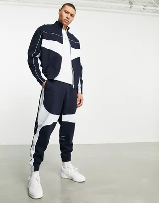 ASOS DESIGN oversized sweatpants in blue color block - part of a set