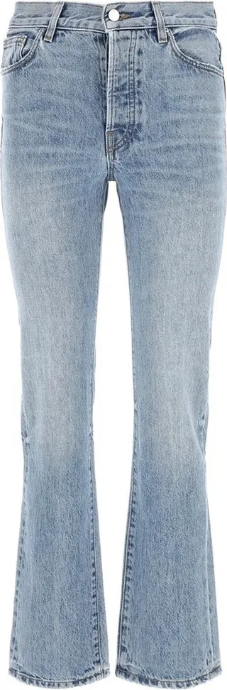 Jeans realized in distressed effect stonewashed pure cotton denim characterized by contrasting logoed label at the back.