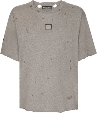 Destroyed cotton T-shirt with branded tag