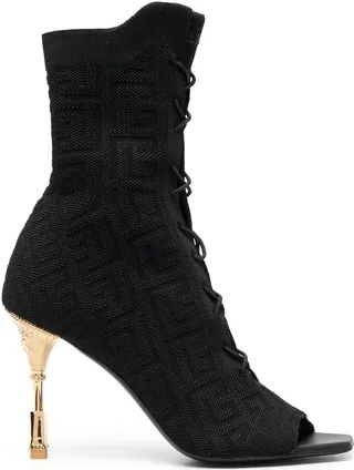 Moneta monogram lace-up boots