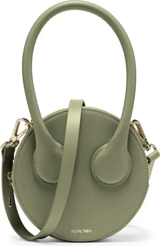 x Ester Manas Round Cake tote bag