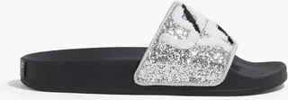 Appliquéd metallic rubber slides