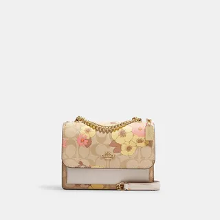 Mini Klare Crossbody In Signature Canvas With Floral Cluster Print