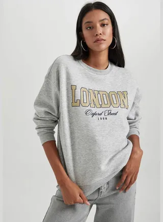 Woman Crew Neck Long Sleeve Knitted Sweatshirt