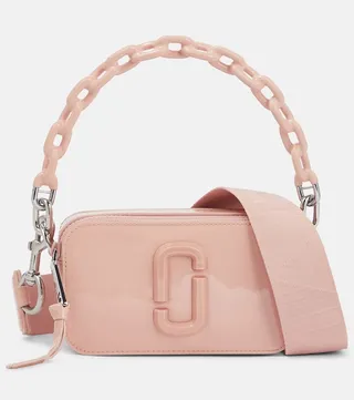 The Snapshot patent leather camera bag