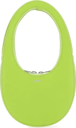 Handbag realized in smooth calf leather characterized by contrasting printed logo at the front enriched by logoed label on the side.