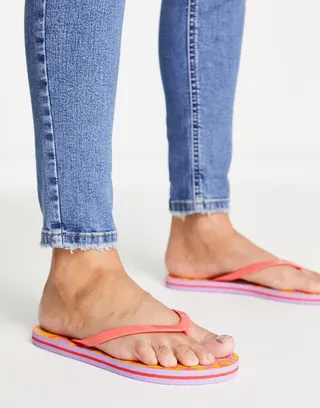 Vero Moda flip flops in orange & lilac print
