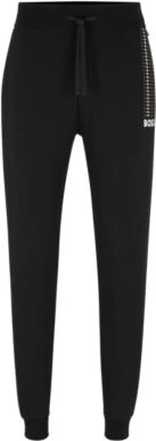 Cotton-terry tracksuit bottoms with dot stripes and logo