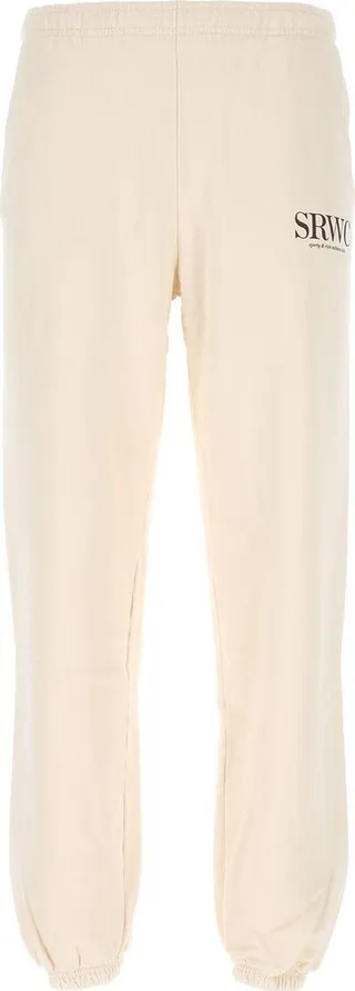 Joggers realized in pure cotton characterized by contrasting printed logo at the front.