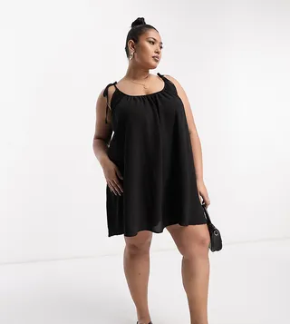 ASOS DESIGN Curve tie strap detail trapeze mini slip dress in black